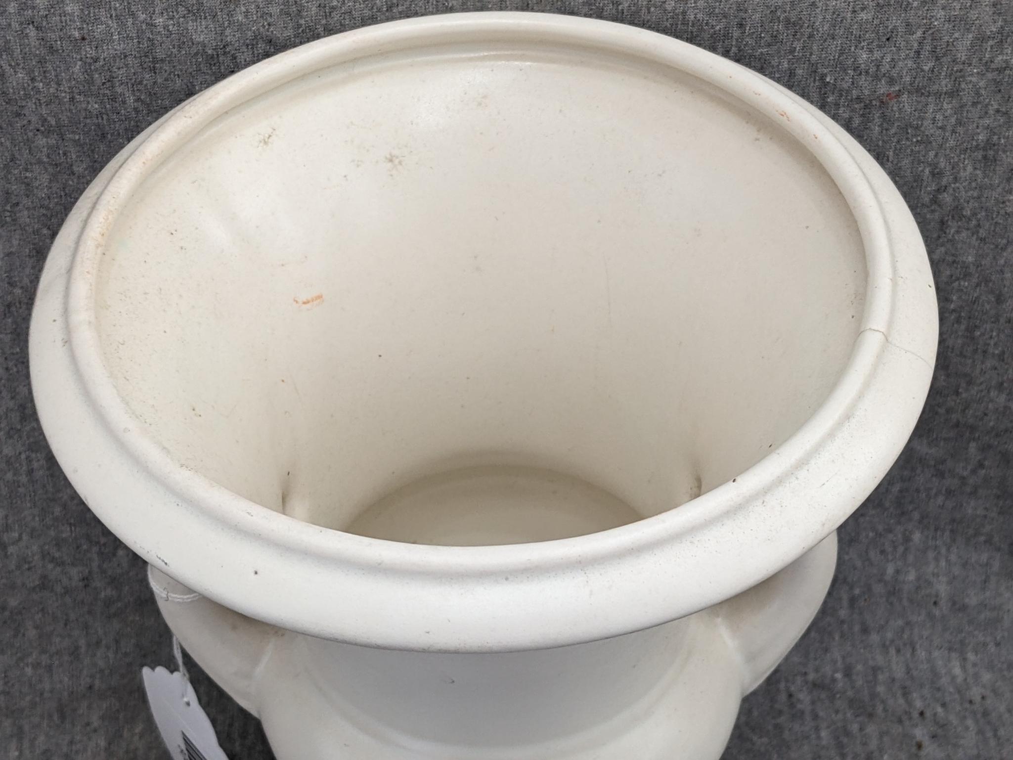 Haeger and other vase are both about 9-1/2" tall. Hairline crack noted on each rim, but otherwise