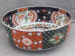 Unique Oriental salad bowl is 9-3/4" wide and in great condition. Japanese type mark noted on