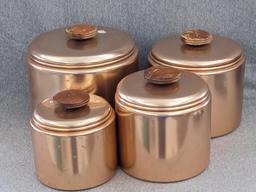 Set of Mirro rose gold canisters. Up to 4 qts. Knobs a little worn but canisters in good condition.