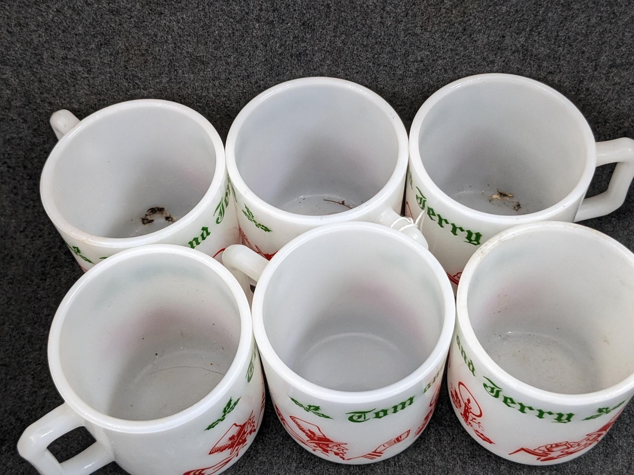Vintage Hazel Atlas Tom and Jerry Eggnog bowl and cups. Bowl measures 9" wide, mugs are 3" tall all