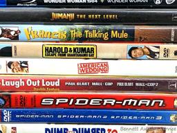 Thirteen DVDs including Jumanji, American Wedding, Spider-Man, Dumb and Dumber To, Daddy's Home,