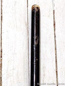 Sturdy corn broom has a wooden handle.