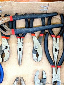 Set of WorkPro pliers; another set of pliers, largest set of slip joint pliers are 10".