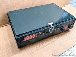 Coleman two burner propane camp stove is 18" x 12" x 5" and comes with original box.