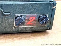 Coleman two burner propane camp stove is 18" x 12" x 5" and comes with original box.