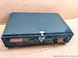 Coleman two burner propane camp stove is 18" x 12" x 5" and comes with original box.