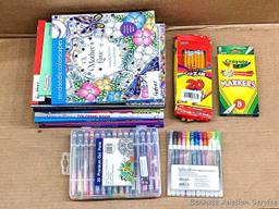 CraZArt, Zendoodle and other coloring books. Also includes some gel pens, pencils and markers.