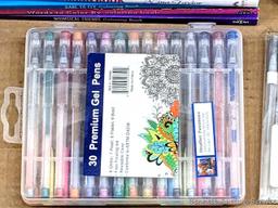 CraZArt, Zendoodle and other coloring books. Also includes some gel pens, pencils and markers.