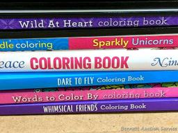 CraZArt, Zendoodle and other coloring books. Also includes some gel pens, pencils and markers.