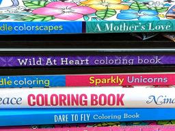 CraZArt, Zendoodle and other coloring books. Also includes some gel pens, pencils and markers.