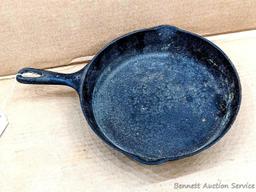Volrath Ware No. 8 cast iron skillet is 10-1/2" diameter and in overall good condition.