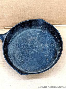 Volrath Ware No. 8 cast iron skillet is 10-1/2" diameter and in overall good condition.