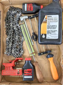 Chain saw lot incl. bar and chain oil, files and file guides, 2 stroke oil, and chains up to 21 1/2"