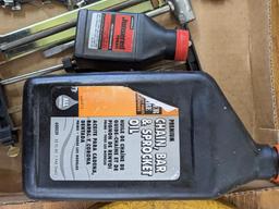 Chain saw lot incl. bar and chain oil, files and file guides, 2 stroke oil, and chains up to 21 1/2"