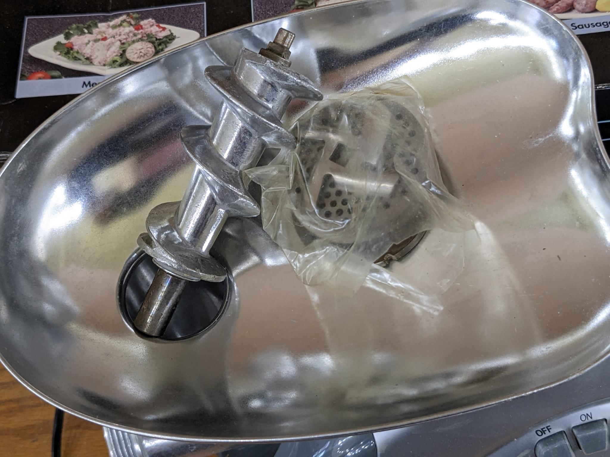 Deni Professional meat grinder, the grinder shows little use and looks like it has all the parts.