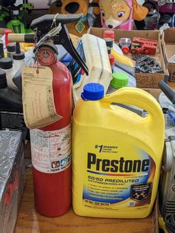 No shipping. Kidde fire extinguisher, gauge reads charged, and a 1 gallon jug of Prestone 50/50
