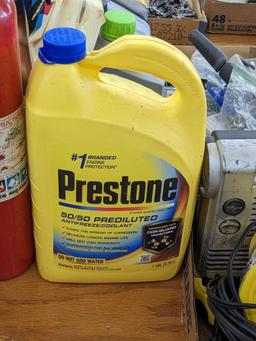 No shipping. Kidde fire extinguisher, gauge reads charged, and a 1 gallon jug of Prestone 50/50