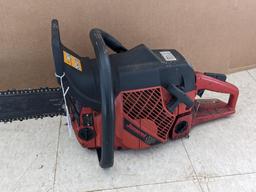 Jonsered 2065 Turbo chainsaw with a 20" bar and an impressive 65 cc engine. Comes with bar cover and