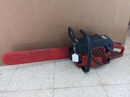 Jonsered 2065 Turbo chainsaw with a 20" bar and an impressive 65 cc engine. Comes with bar cover and