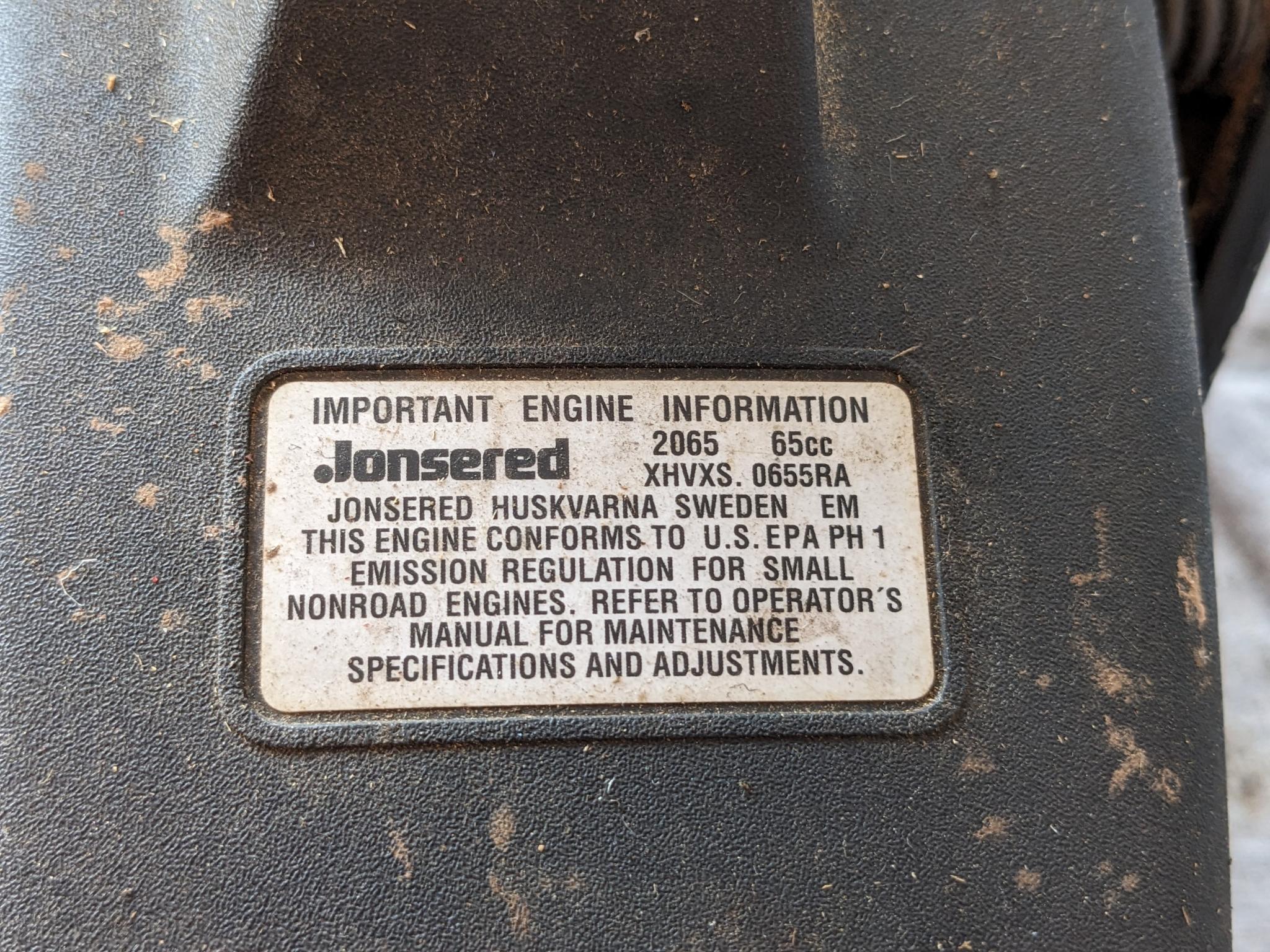 Jonsered 2065 Turbo chainsaw with a 20" bar and an impressive 65 cc engine. Comes with bar cover and
