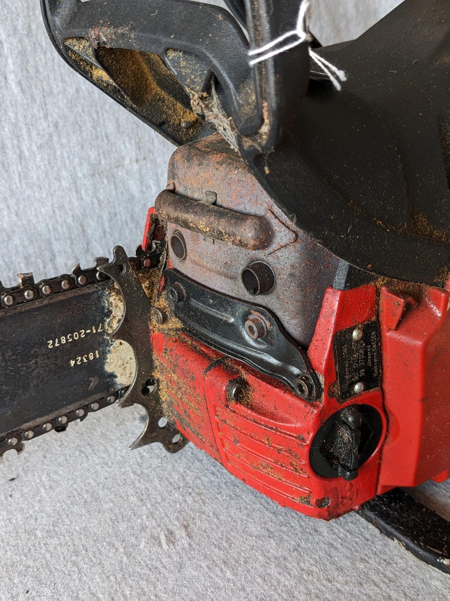 Jonsered 2065 Turbo chainsaw with a 20" bar and an impressive 65 cc engine. Comes with bar cover and