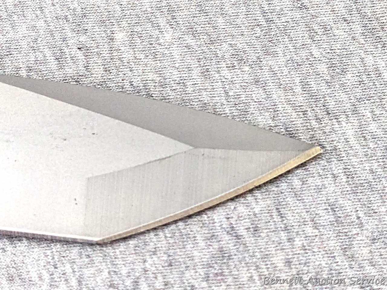 Reapr brand sheath knife is about 10" long and in good condition.