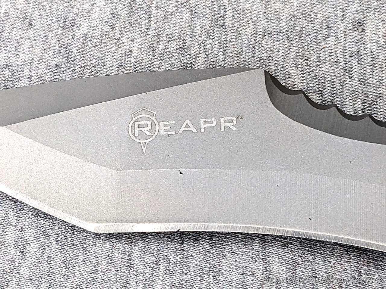Reapr brand sheath knife is about 10" long and in good condition.