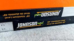 2 Sets of construction levels, one set is orange plastic and measures 24"; second set is aluminum