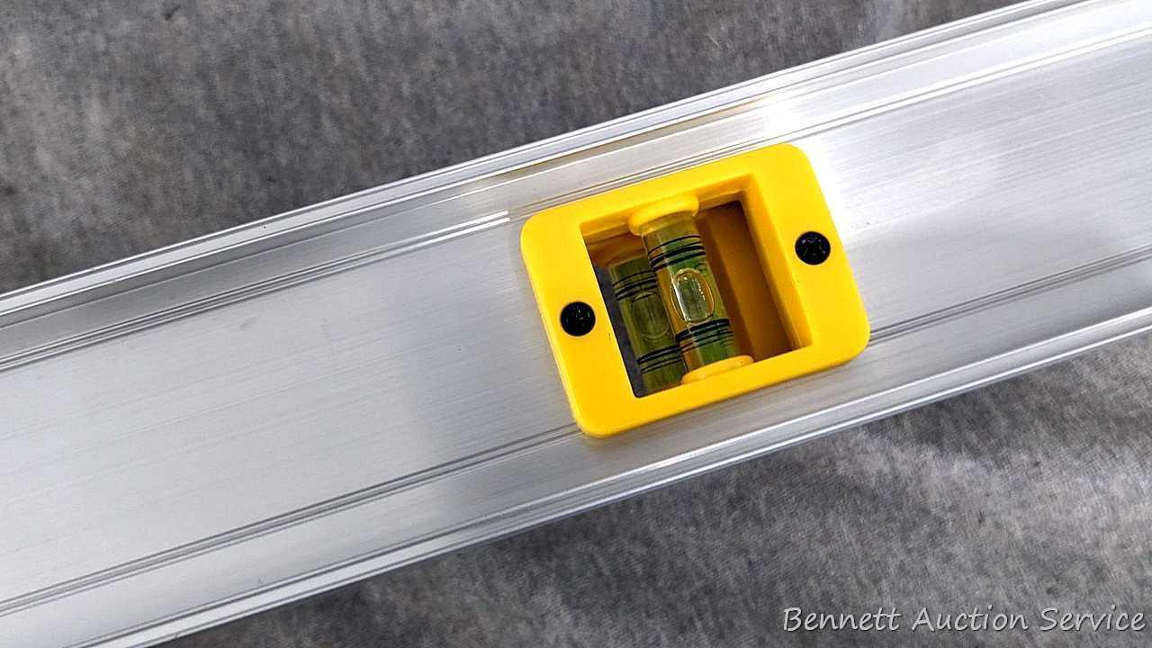2 Sets of construction levels, one set is orange plastic and measures 24"; second set is aluminum