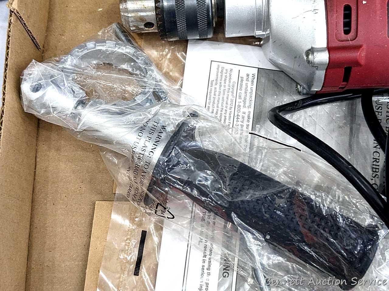Chicago Electric 1/2" VSR hammer drill with handle and manual. Runs and is in good condition. Comes