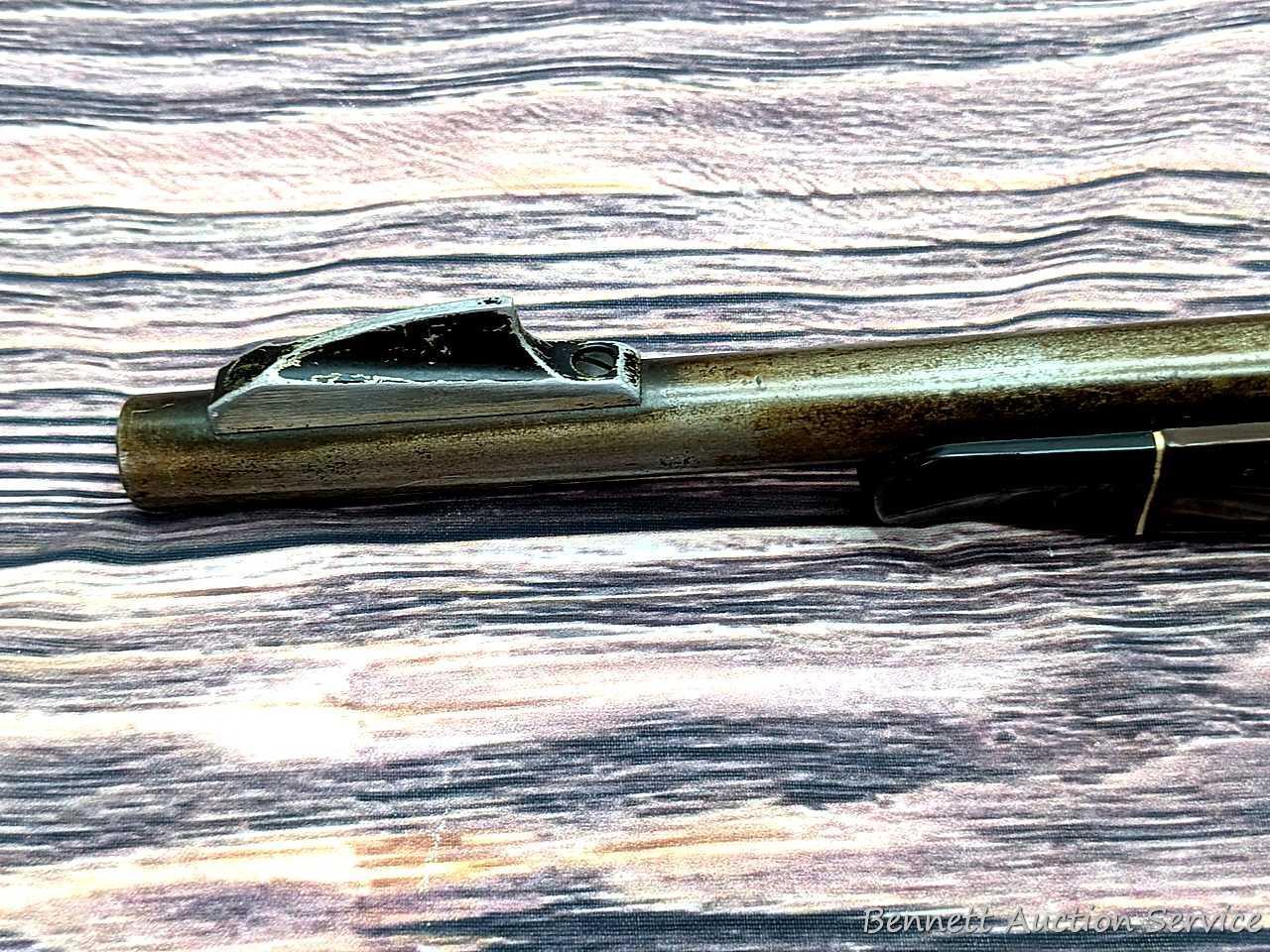 Remington Nylon 76 lever action .22 rifle. The 19-1/2" barrel has a mirror bore with sharp rifling.