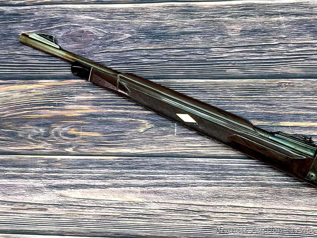 Remington Nylon 76 lever action .22 rifle. The 19-1/2" barrel has a mirror bore with sharp rifling.