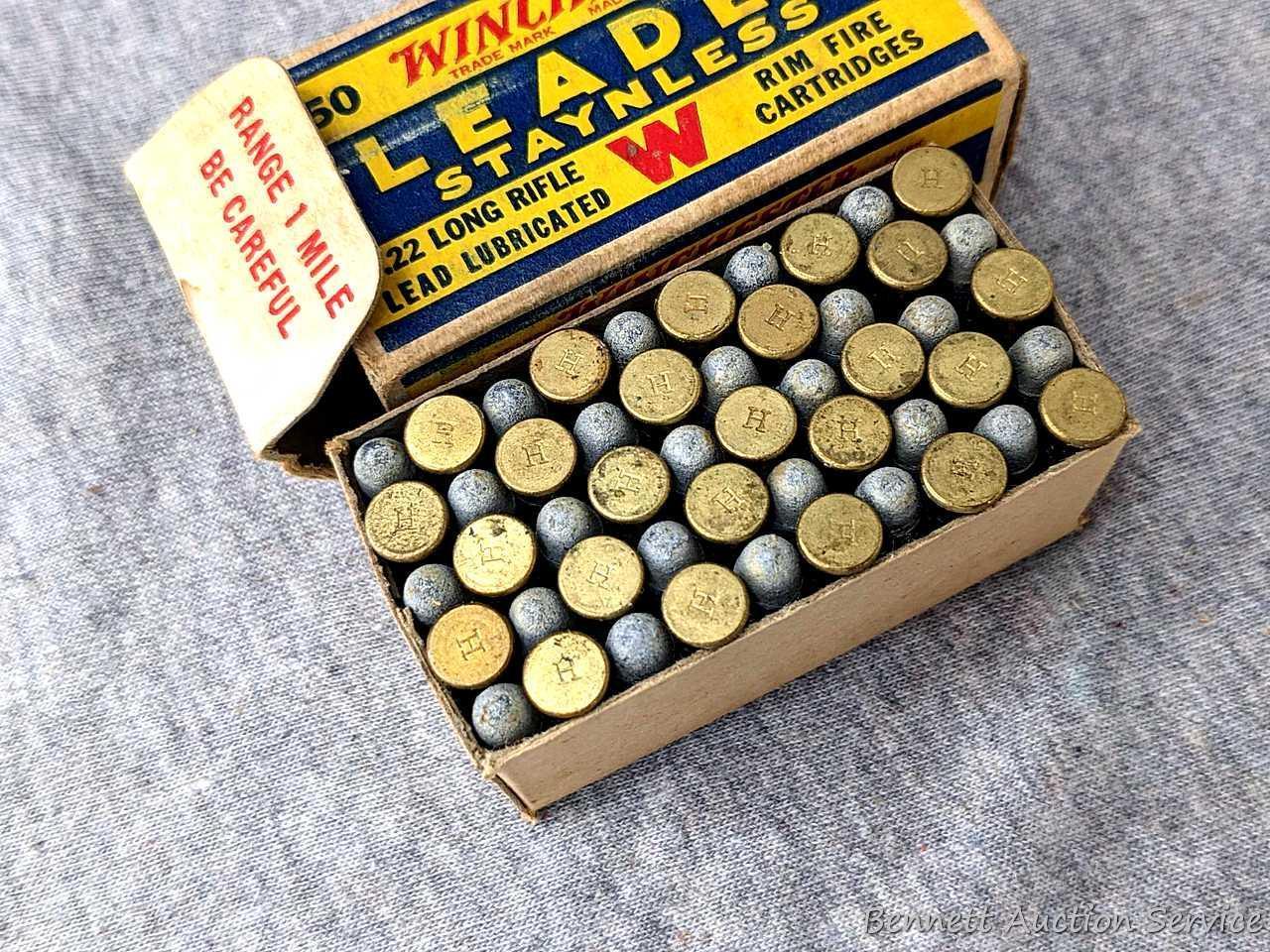 50 rounds of Winchester Leader Staynless .22 long rifle ammunition in an awesome old Winchester box.