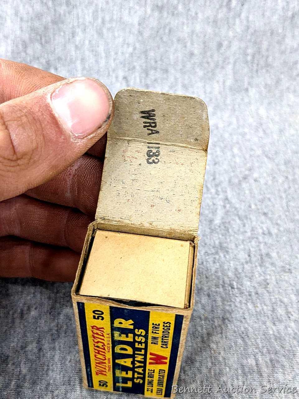 50 rounds of Winchester Leader Staynless .22 long rifle ammunition in an awesome old Winchester box.