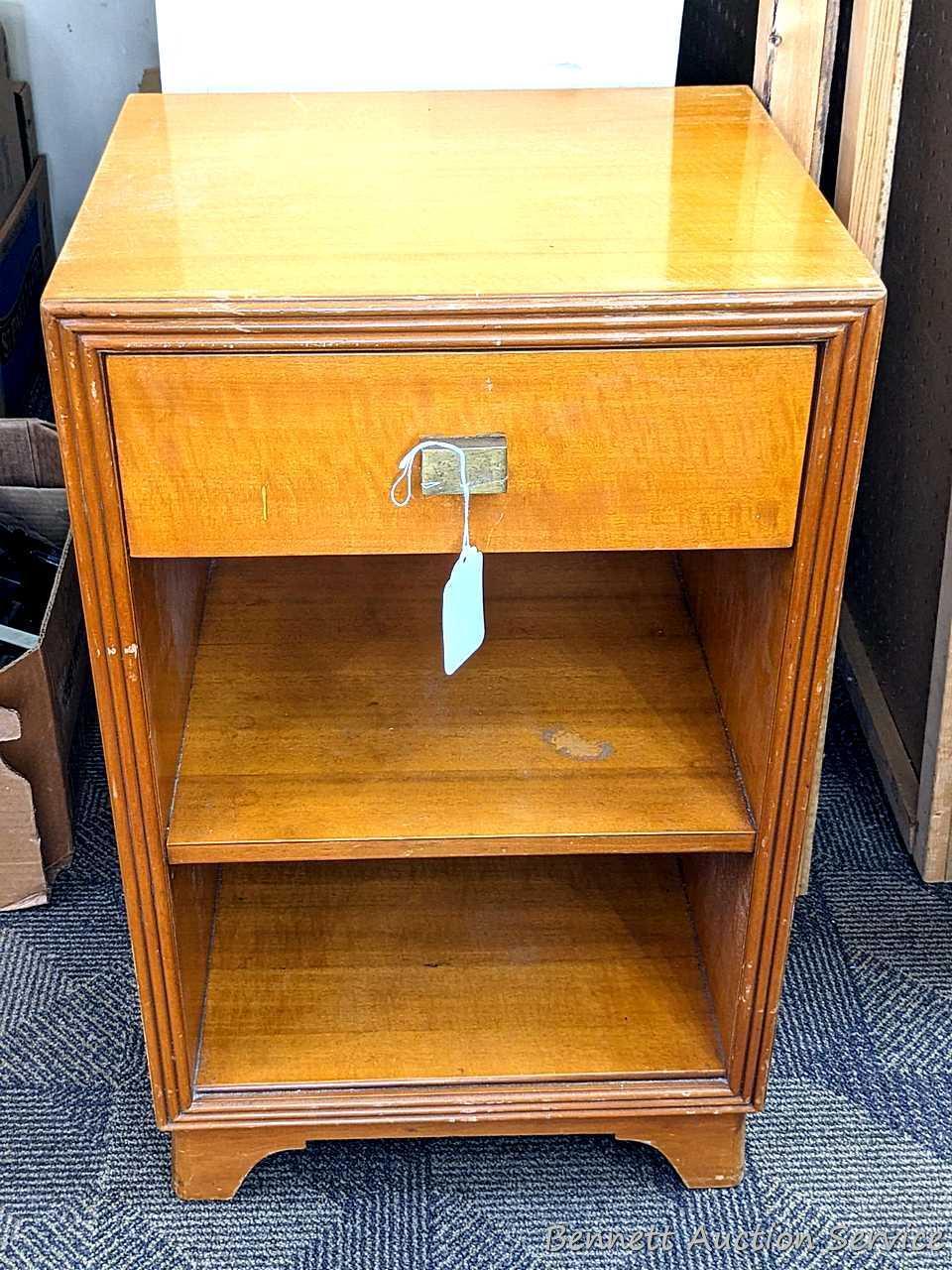Bedside or end table with fixed shelves and drawer. Measures 26" tall, x 16" wide x 14" deep. Drawer