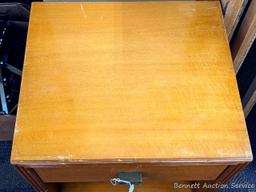 Bedside or end table with fixed shelves and drawer. Measures 26" tall, x 16" wide x 14" deep. Drawer