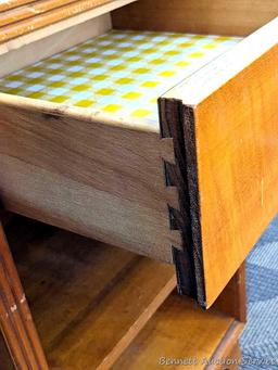 Bedside or end table with fixed shelves and drawer. Measures 26" tall, x 16" wide x 14" deep. Drawer