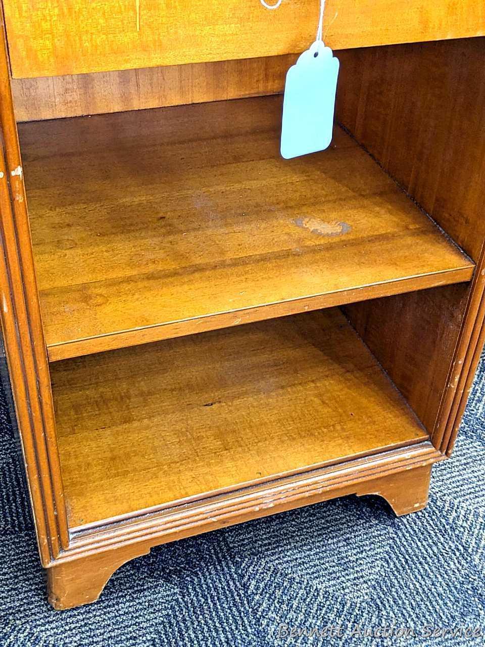 Bedside or end table with fixed shelves and drawer. Measures 26" tall, x 16" wide x 14" deep. Drawer