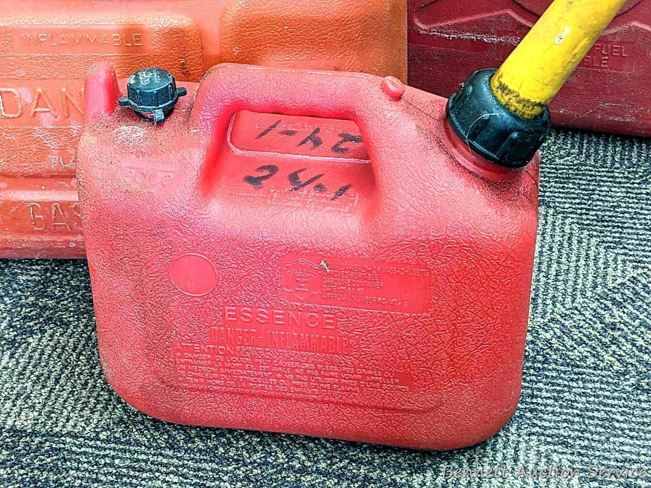 Three gas totes, largest is 6 gallons and the smallest is a 1 gallon tote. All are in good shape and