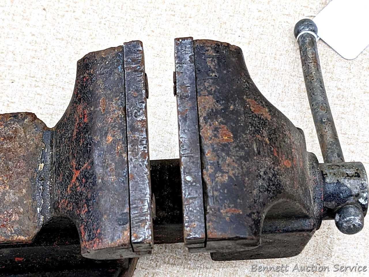 Columbian 4" swiveling bench vice. The vise in in pretty good condition with worn jaws, overall nice