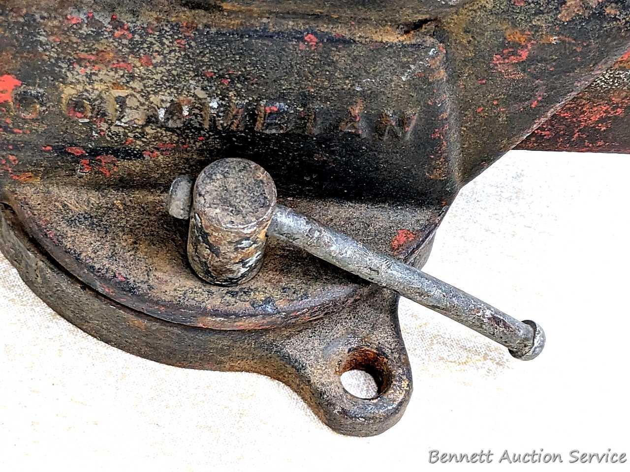 Columbian 4" swiveling bench vice. The vise in in pretty good condition with worn jaws, overall nice