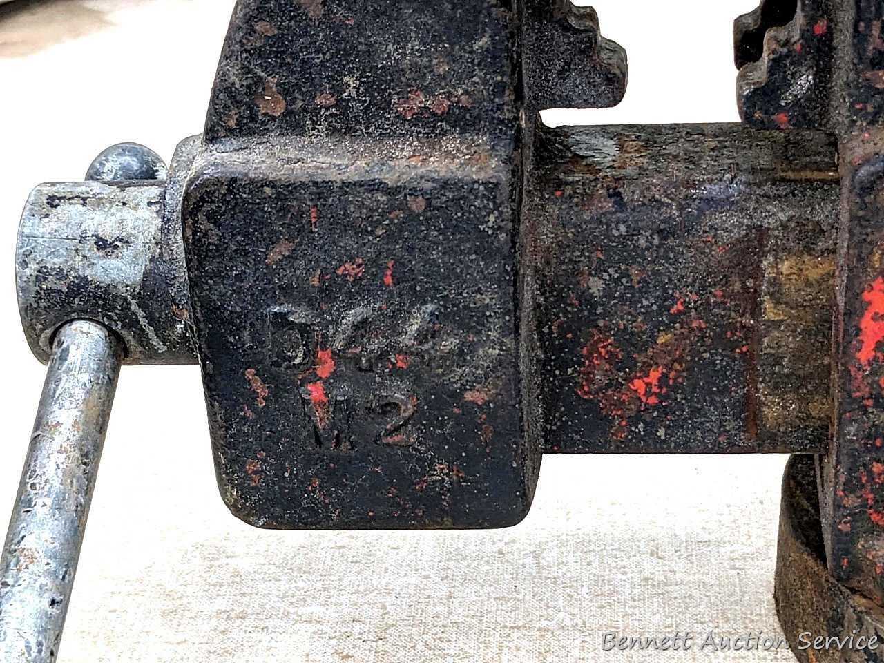Columbian 4" swiveling bench vice. The vise in in pretty good condition with worn jaws, overall nice