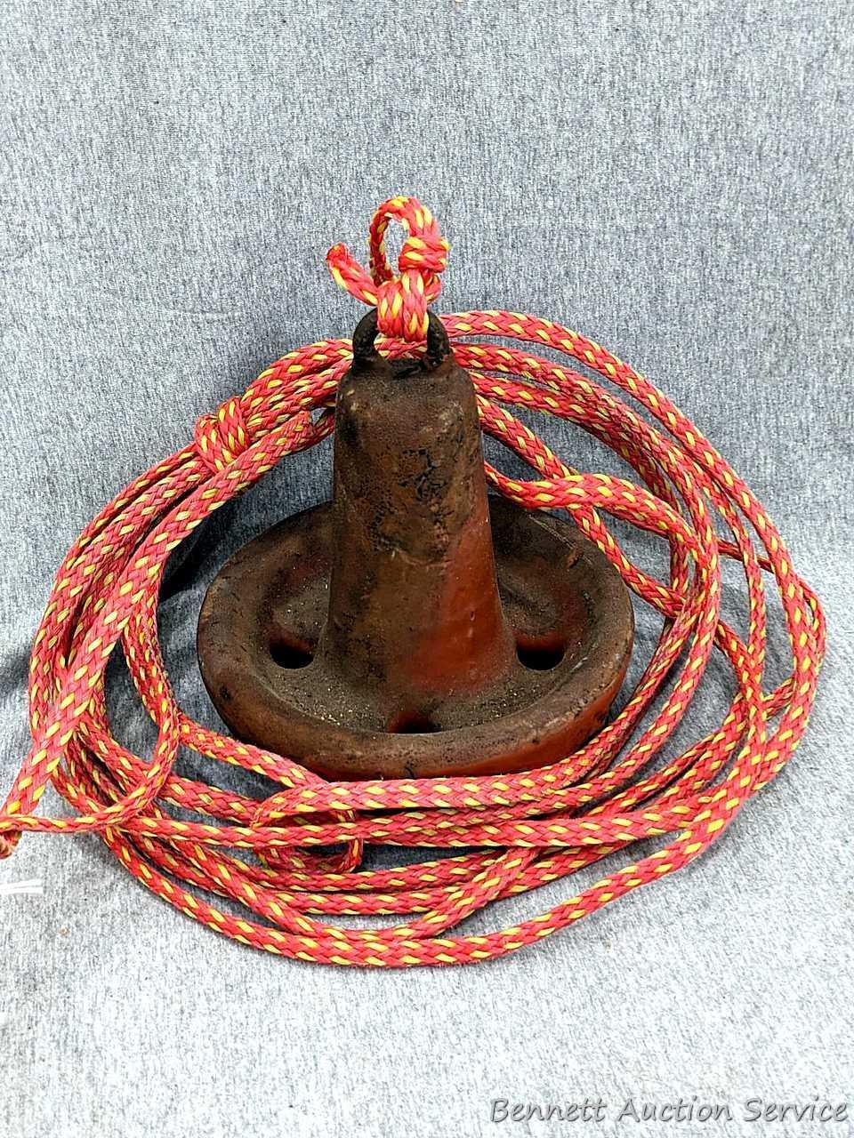 15 lb boat anchor with attached length of rope.