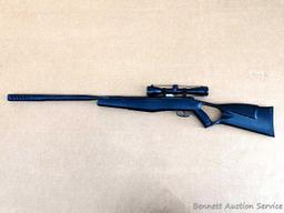 Crosman F4 .177 pellet rifle with a Center Point 4 x 32 scope. The rifle is in very good condition,