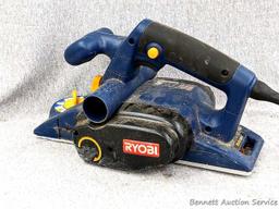 Ryobi 3-1/4" hand planer is model HPL51. The planer runs smoothly and comes with a bunch of