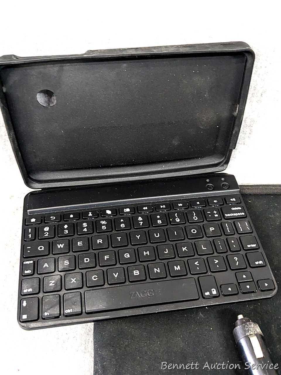 RCA Portable DVD player, ZAGG tablet keyboard case, Casio TV-5 LCD Pocket Color Television and 11"