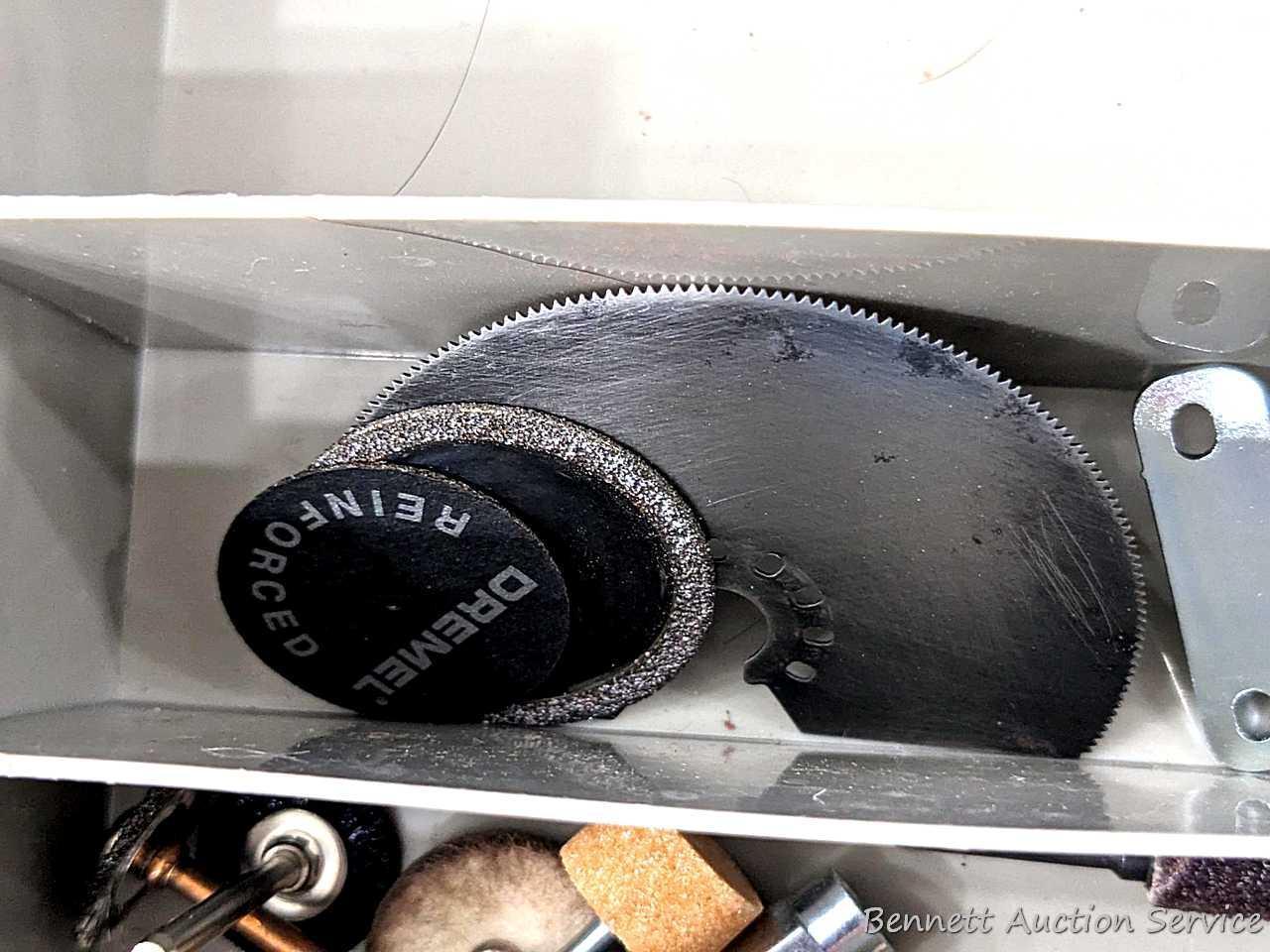 Dremel brand rotary tool attachments, plus a variety of sanding discs, drum sander pieces, cutting