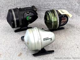 Vintage Johnson fishing reel plus another Johnson reel and a Cisco reel. All handles turn smoothly.