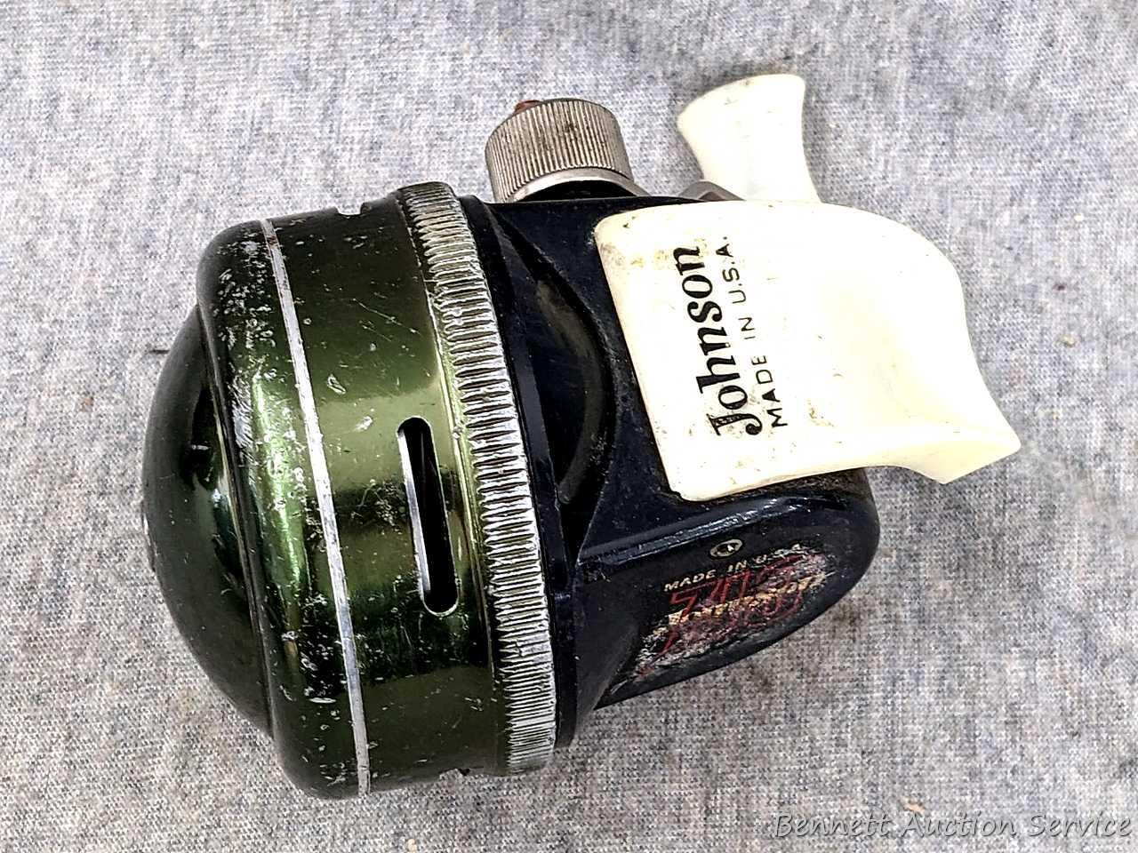 Vintage Johnson fishing reel plus another Johnson reel and a Cisco reel. All handles turn smoothly.