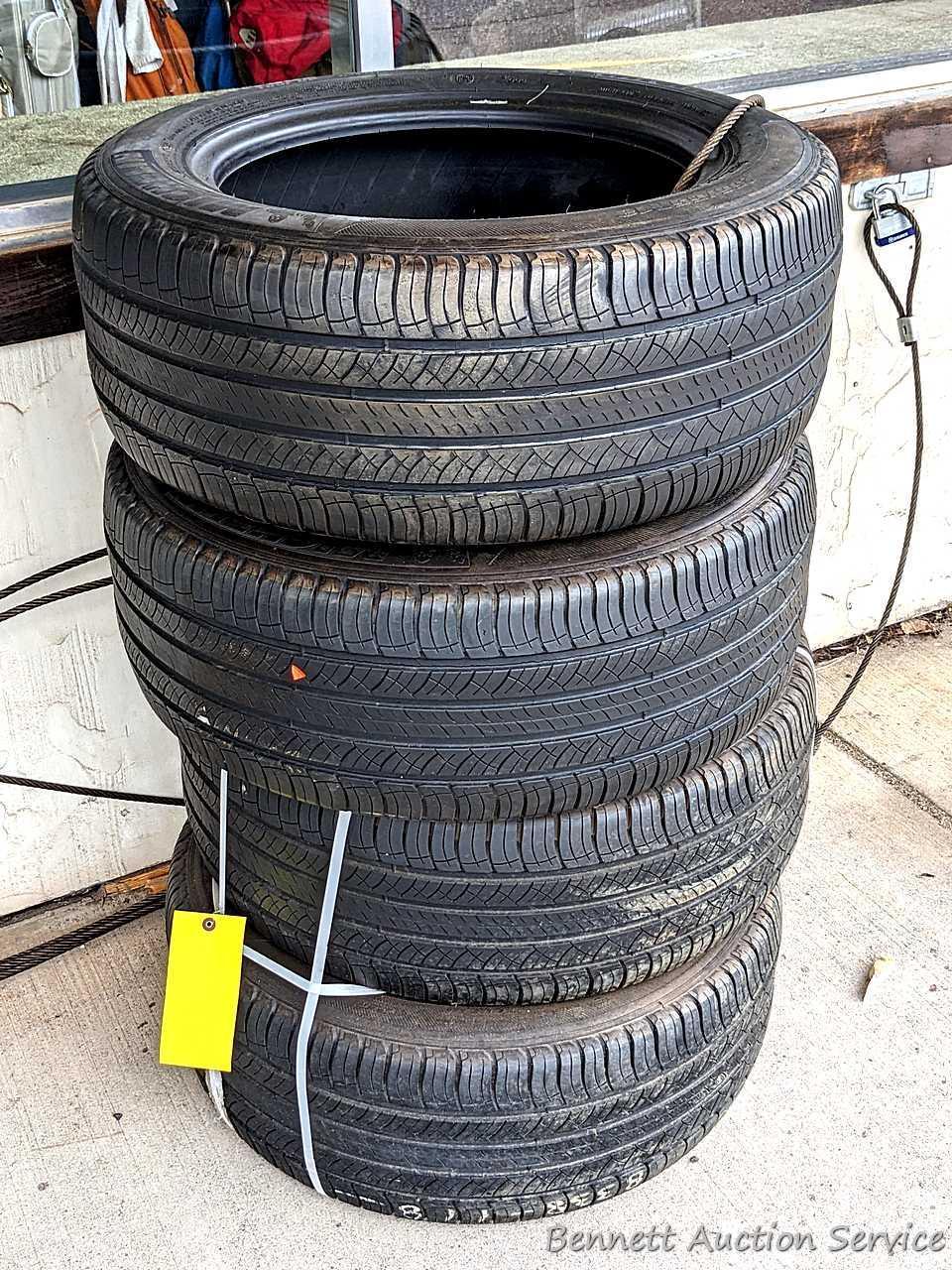 Set of 4 Michelin Latitude Tour HP tires are marked 255 / 55R18. Some weather checking noted in